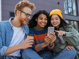 Young people watching video on a phone